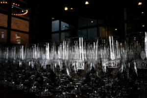 Image shows empty beer glasses lined up before Craft Beer Calling