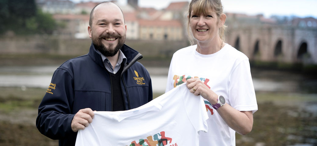 Richard Simpson holding Berwick’s Curfew Run t-shirt with Berwick’s Curfew Run member